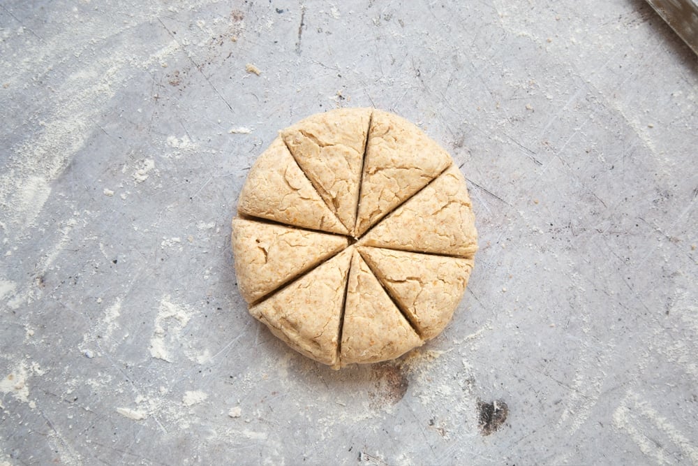 Scone dough cut into eight triangles 