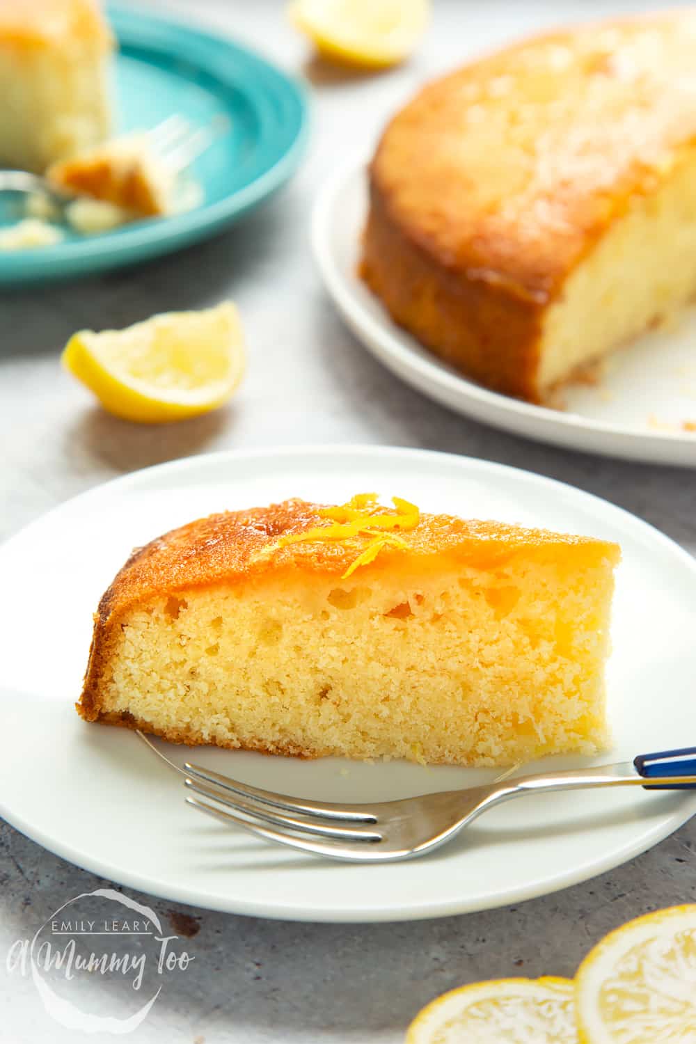 A slice of lemon drizzle cake served on a plate