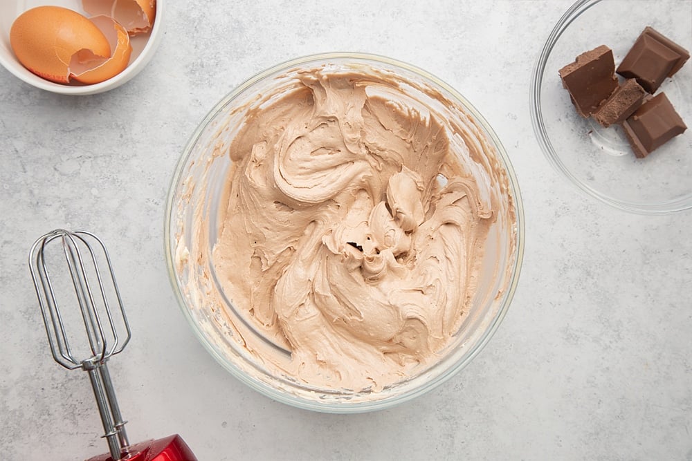 Overhead shot of the chocolate frosting having been mixed together. 