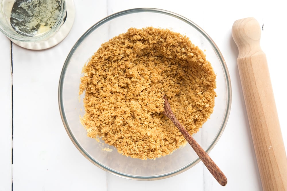 Crumbled biscuits combined with melted butter.