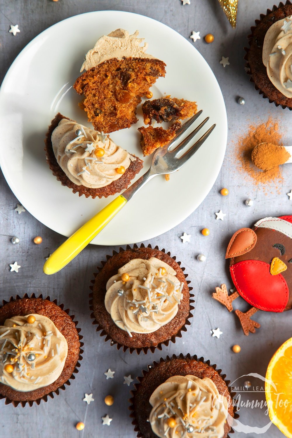 A top-down view of Christmas pudding muffins, cut in half 