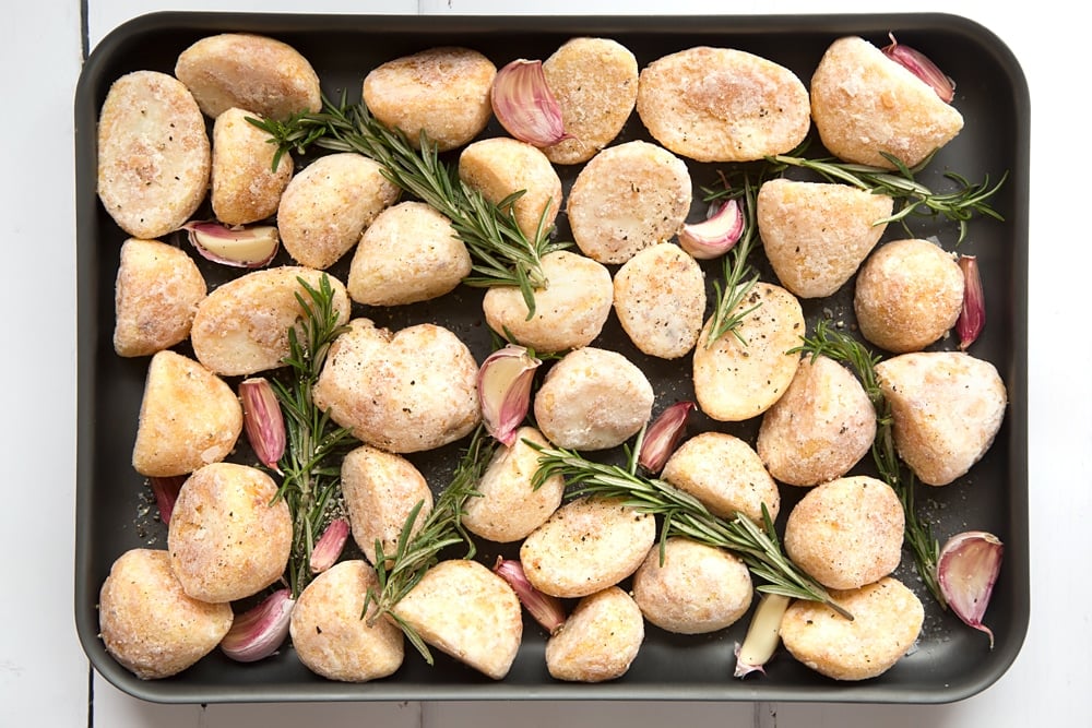 Start looking at how to make frozen roast potatoes taste better by adding rosemary leaves