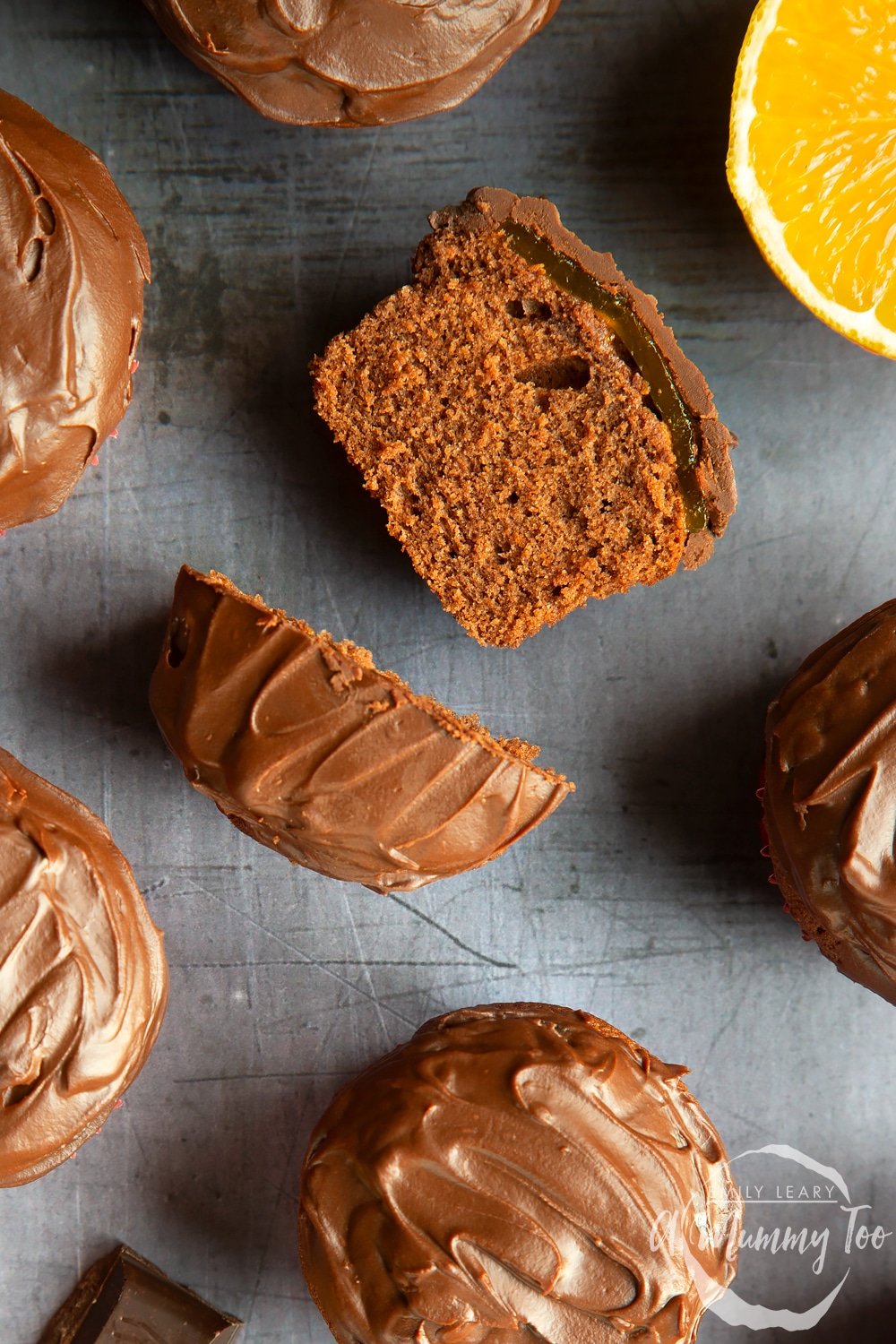 Jaffa cake cupcakes, sliced in half