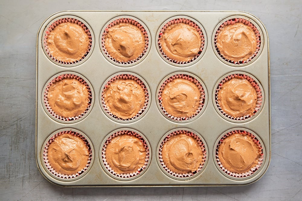 Scoop the cupcake mix into muffin cases