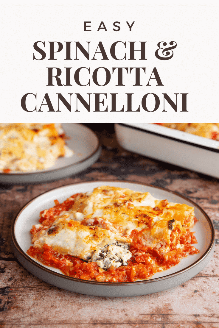 Pinterest image of the spinach and ricotta cannelloni on a plate.