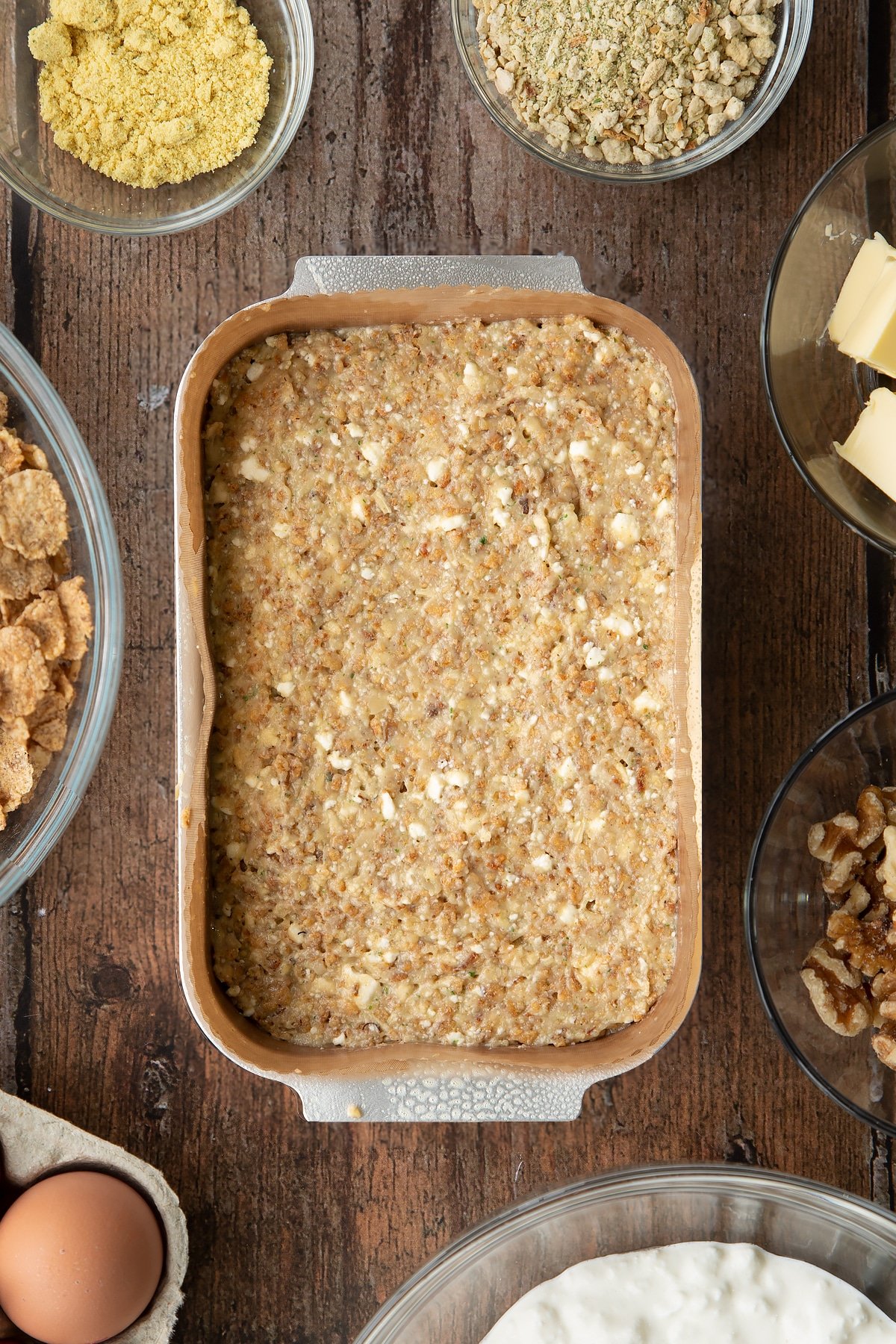 Overhead shot of the special k roast in a lined loaf tin before going in the oven.