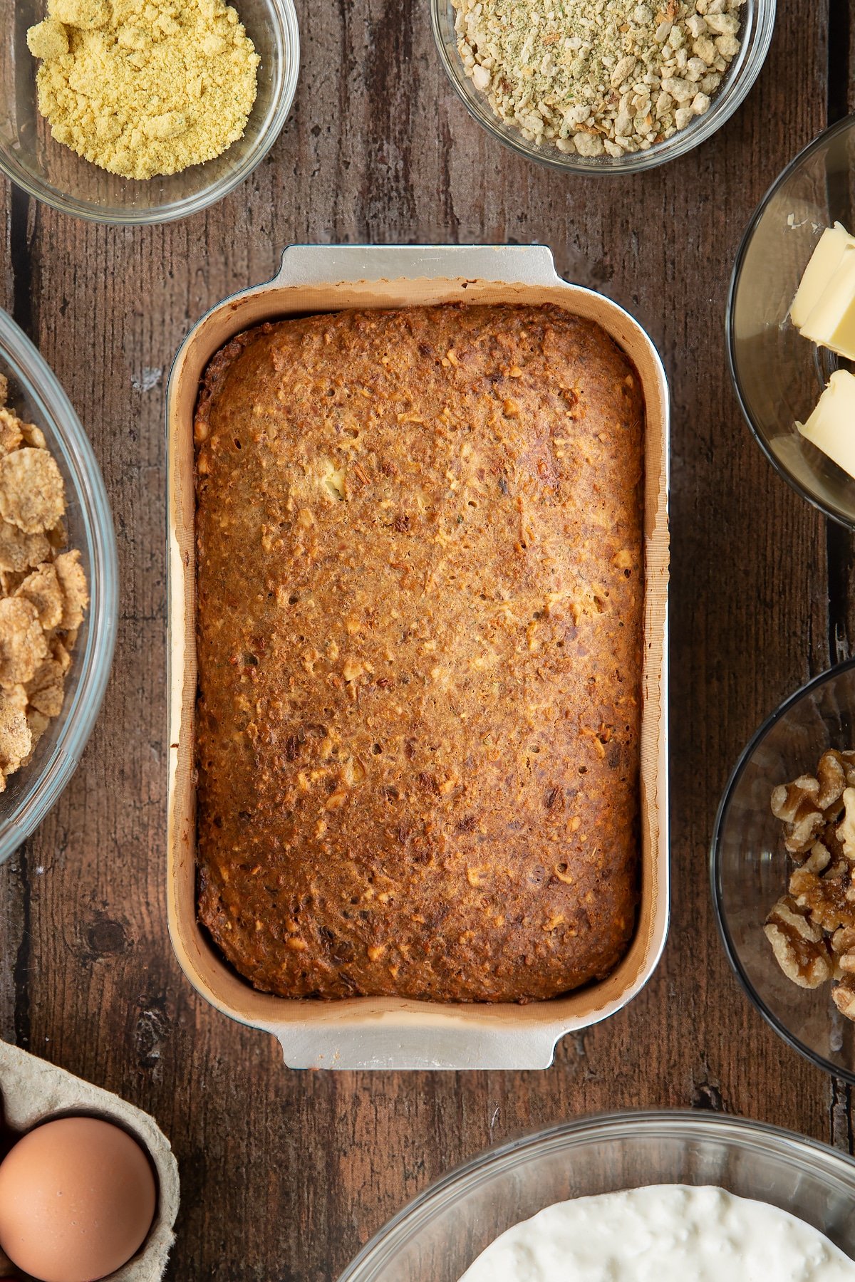 Overhead shot of the special k loaf inside a loaf tin having been in the oven.