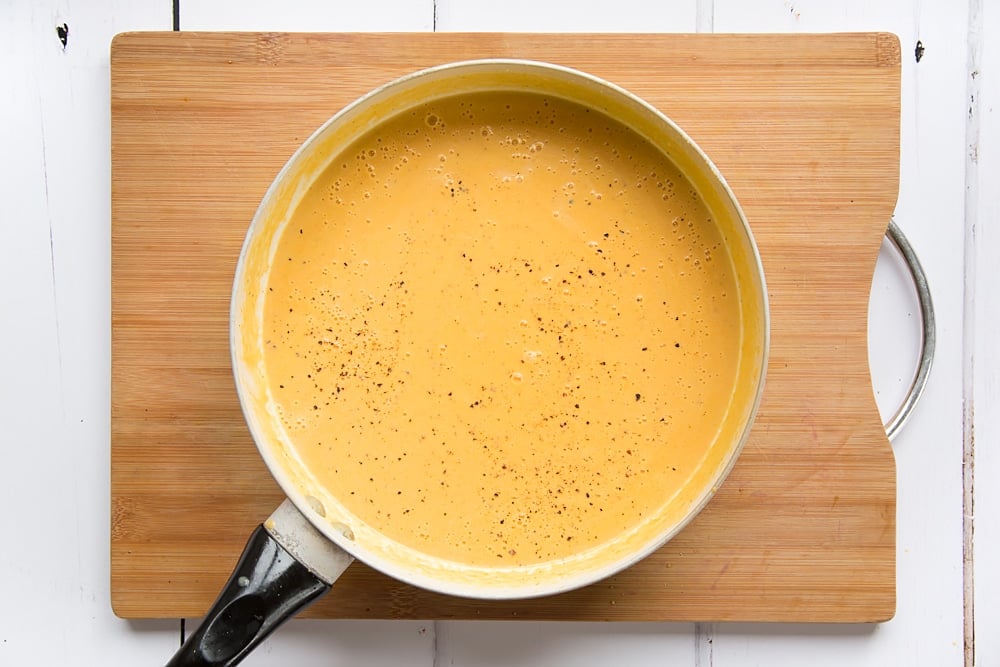 roasted butternut squash soup after being warmed on a medium heat.
