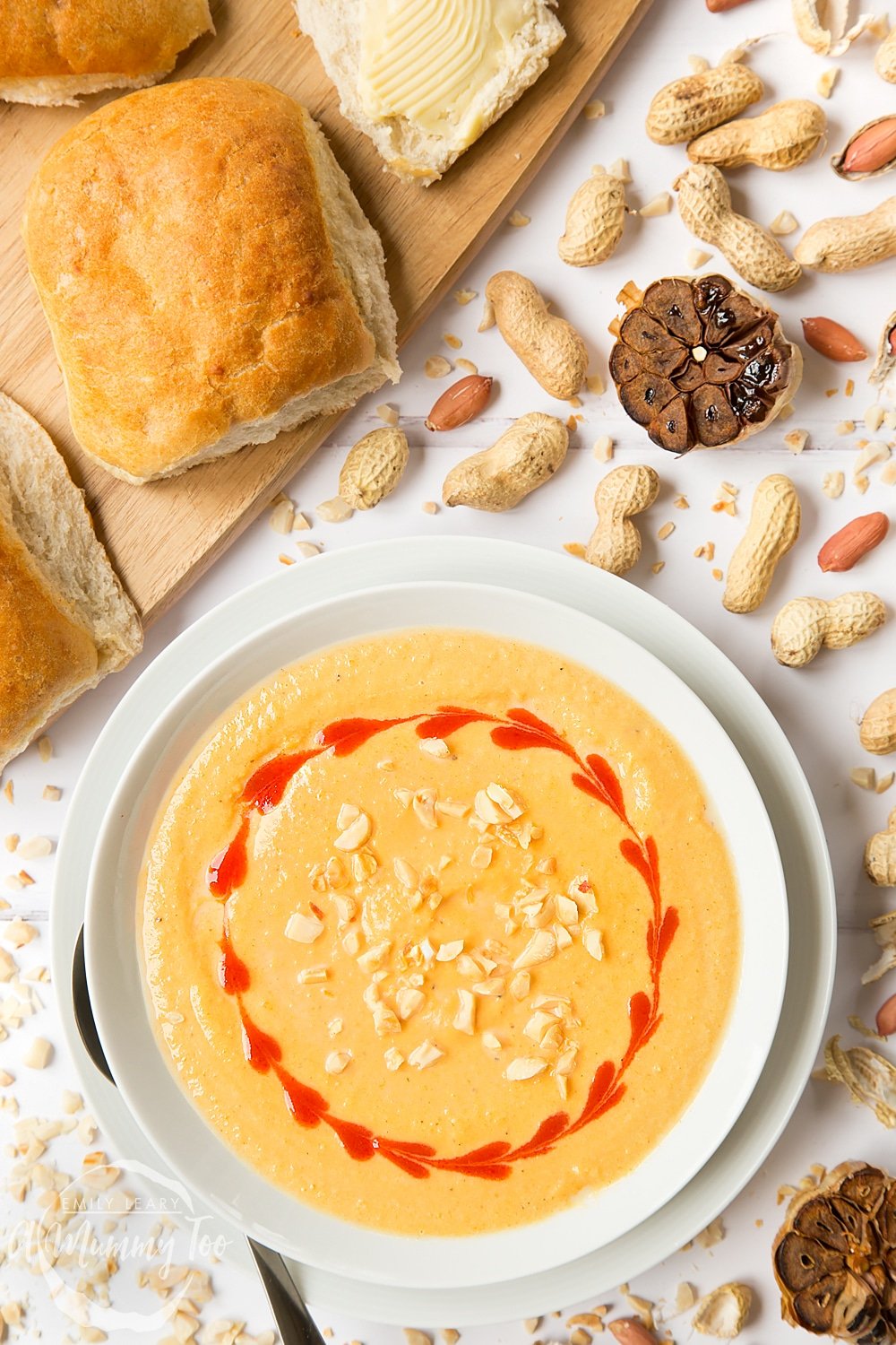 roasted butternut squash soup served with a crusty roll.