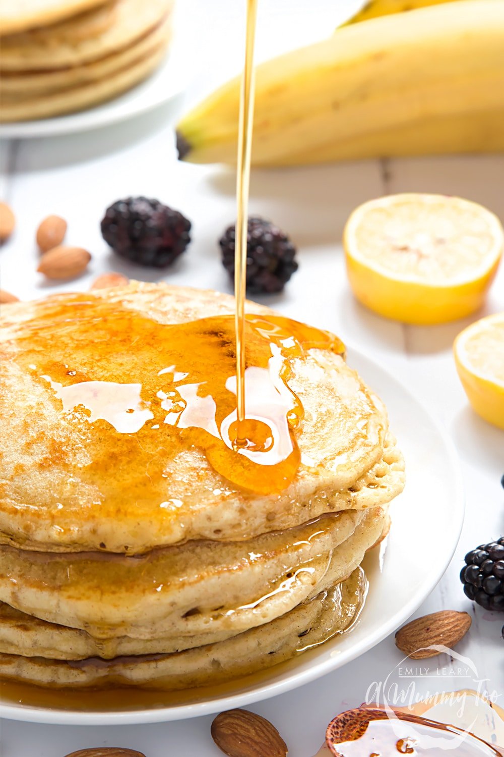 Vegan Vegan american pancakes 
 drizzled with syrup