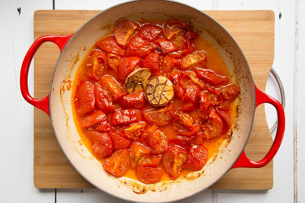 Roasted tomatoes and garlic in a pan