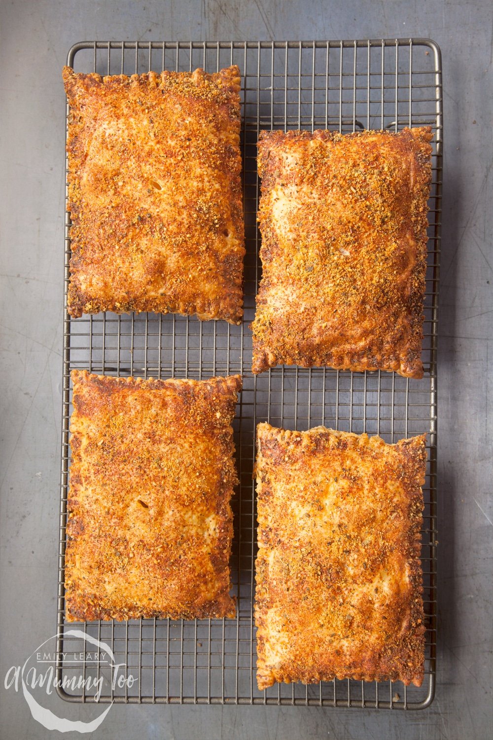 Festive slices having been baked in the oven until they are brown and golden cooling on a wire rack.