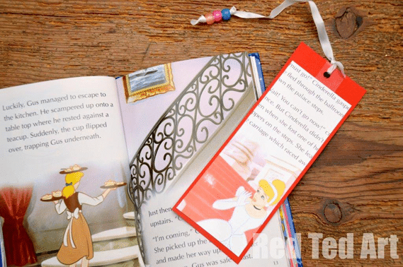 cinderella book with the book open ona desk with a cinderella bookmark