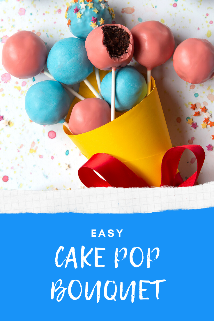 A cake pop bouquet surrounded by other cake pops. The bouquet is made from several blue and pink cake pops, gathered together and wrapped in a yellow paper cone with a red ribbon. Caption reads: easy cake pop bouquet