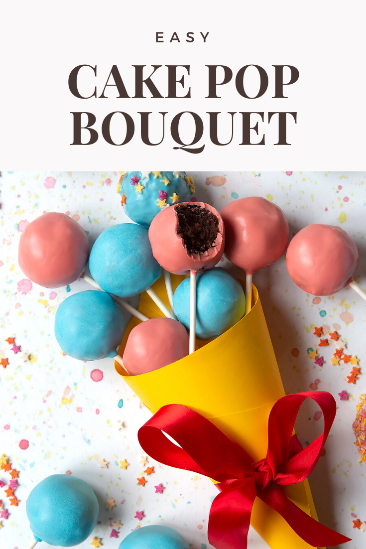 A cake pop bouquet surrounded by other cake pops. The bouquet is made from several blue and pink cake pops, gathered together and wrapped in a yellow paper cone with a red ribbon. One of the cake pops has a bite taken out of it, showing the chocolate sponge filling inside. Caption reads: Easy cake pop bouquet. 