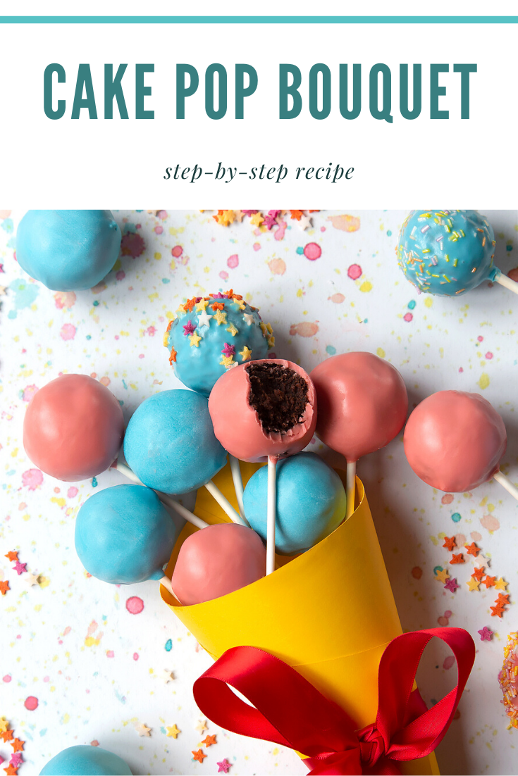 A cake pop bouquet surrounded by other cake pops. The bouquet is made from several blue and pink cake pops, gathered together and wrapped in a yellow paper cone with a red ribbon. One of the cake pops has a bite taken out of it, showing the chocolate sponge filling inside. Caption reads: cake pop bouquet step-by-step recipe