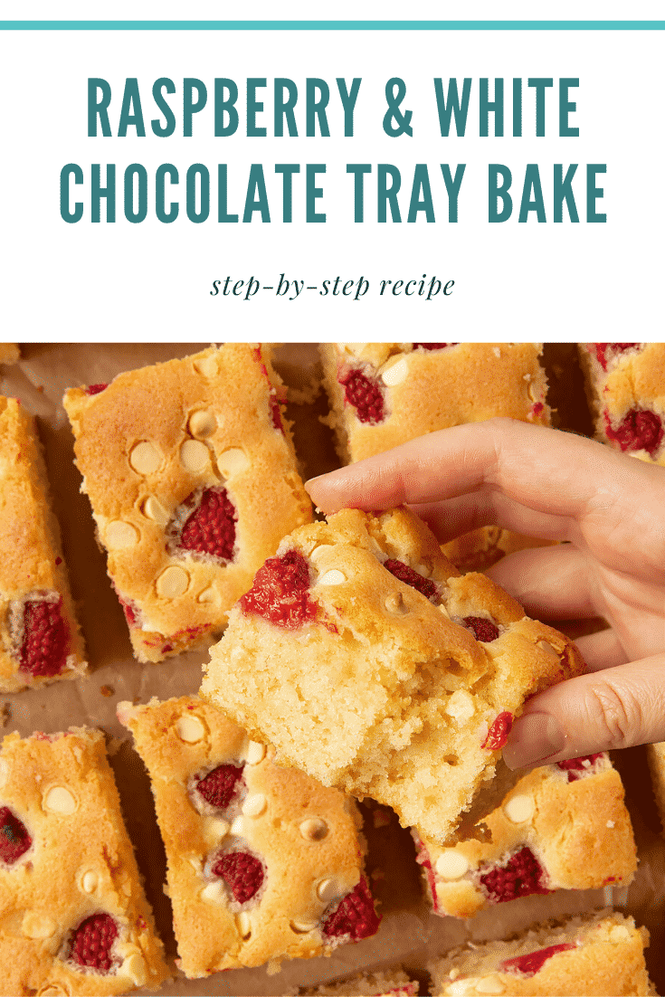 A raspberry and white chocolate traybake cut into 16 pieces. A hand holds a piece. Caption reads: raspberry and white chocolate traybake step-by-step recipe