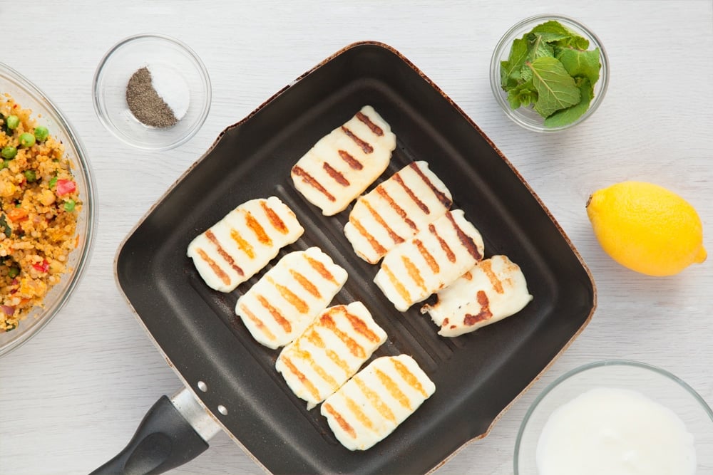 Halloumi grilling in a pan