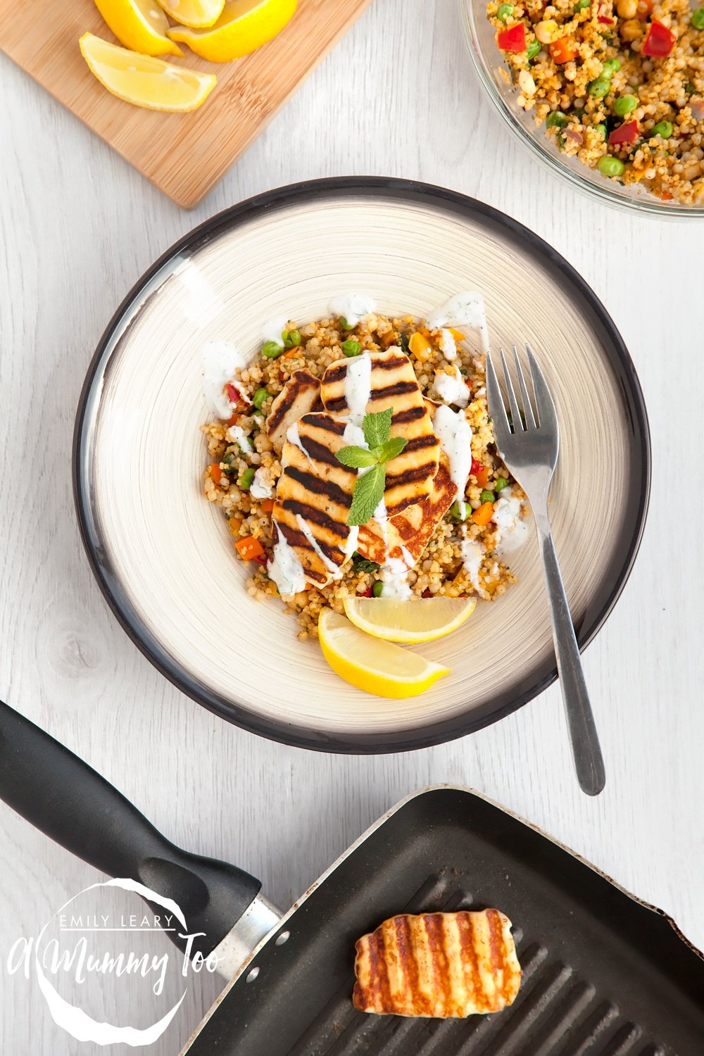 Vegetable rich couscous topped with dry-fried halloumi and drizzled with a zesty mint yoghurt dressing.