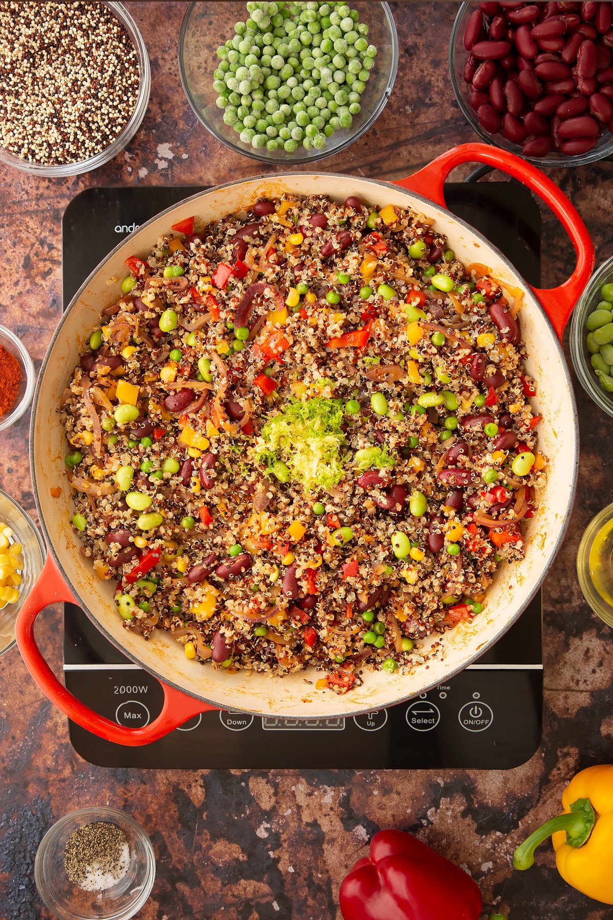 Overhead shot of some of the ingredients mixed together in a pan on the hob.