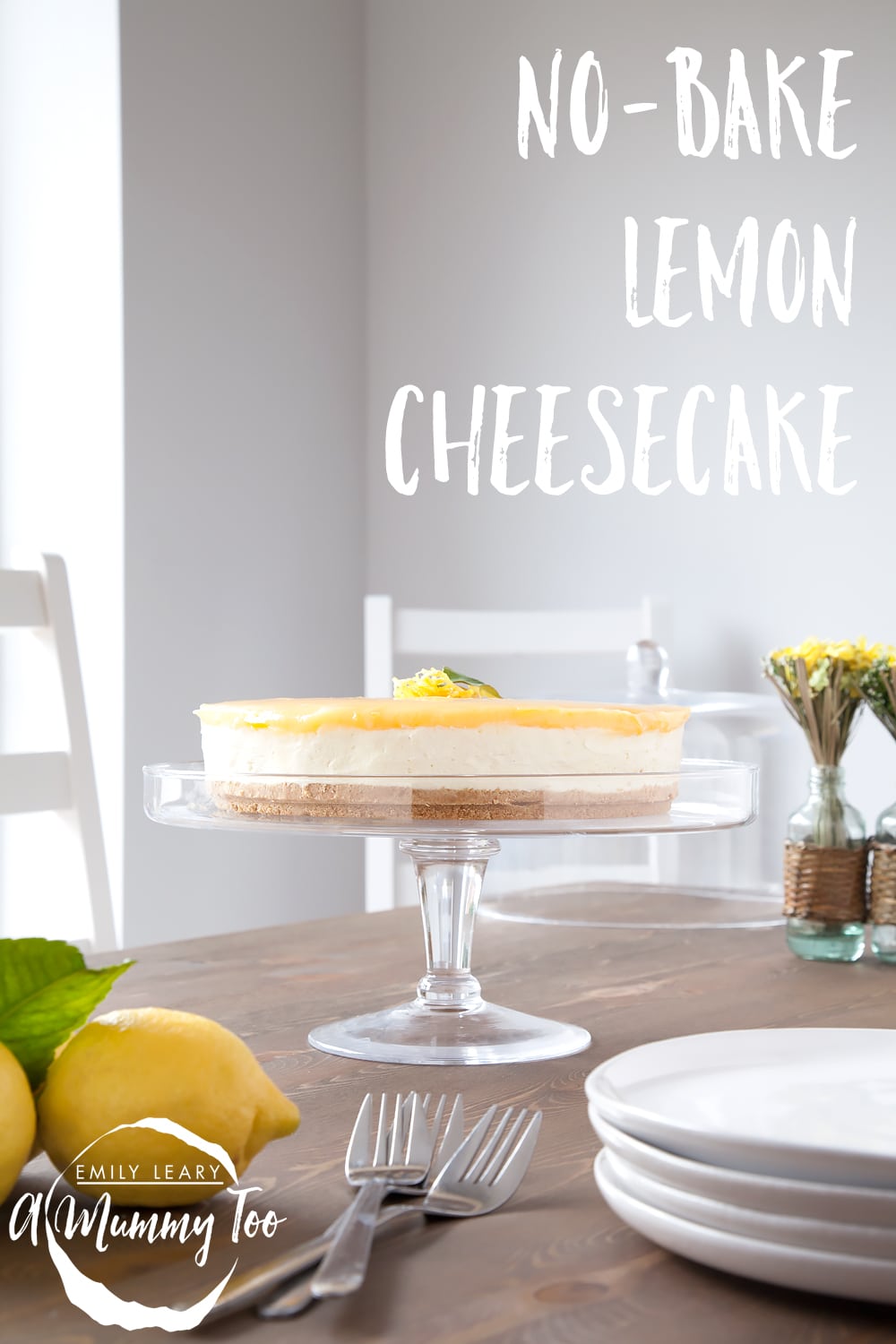 No-bake lemon curd and white chocolate cheesecake on a stand. A caption reads: no-bake lemon cheesecake.