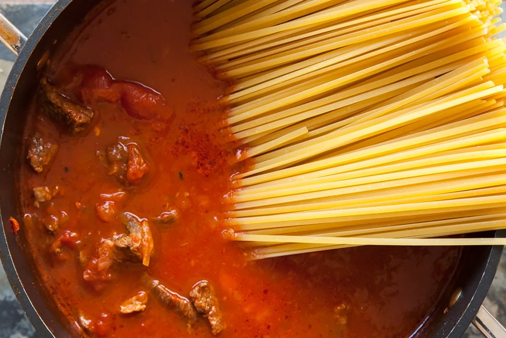 Add the beef and linguine to the pot to create the beef ragu linguine