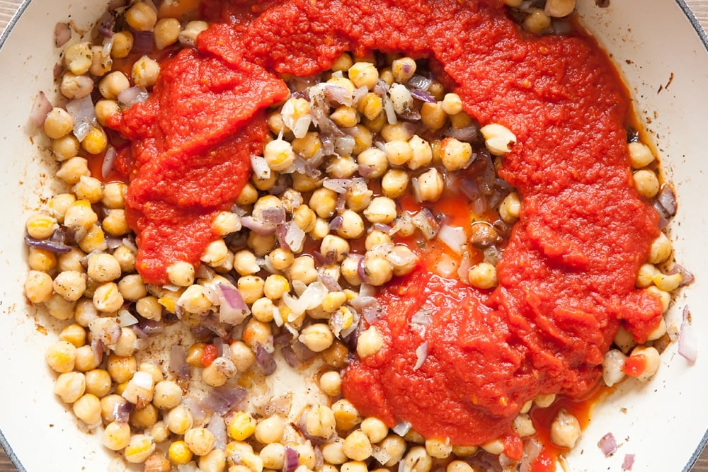 Add the Cirio passata into the frying pan
