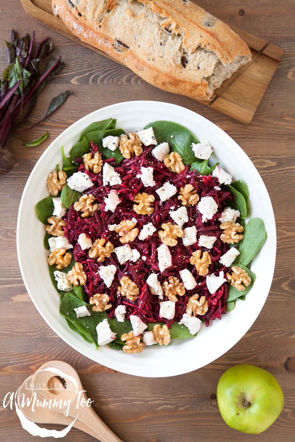 Top your apple and beetroot salad with goat's cheese and walnuts