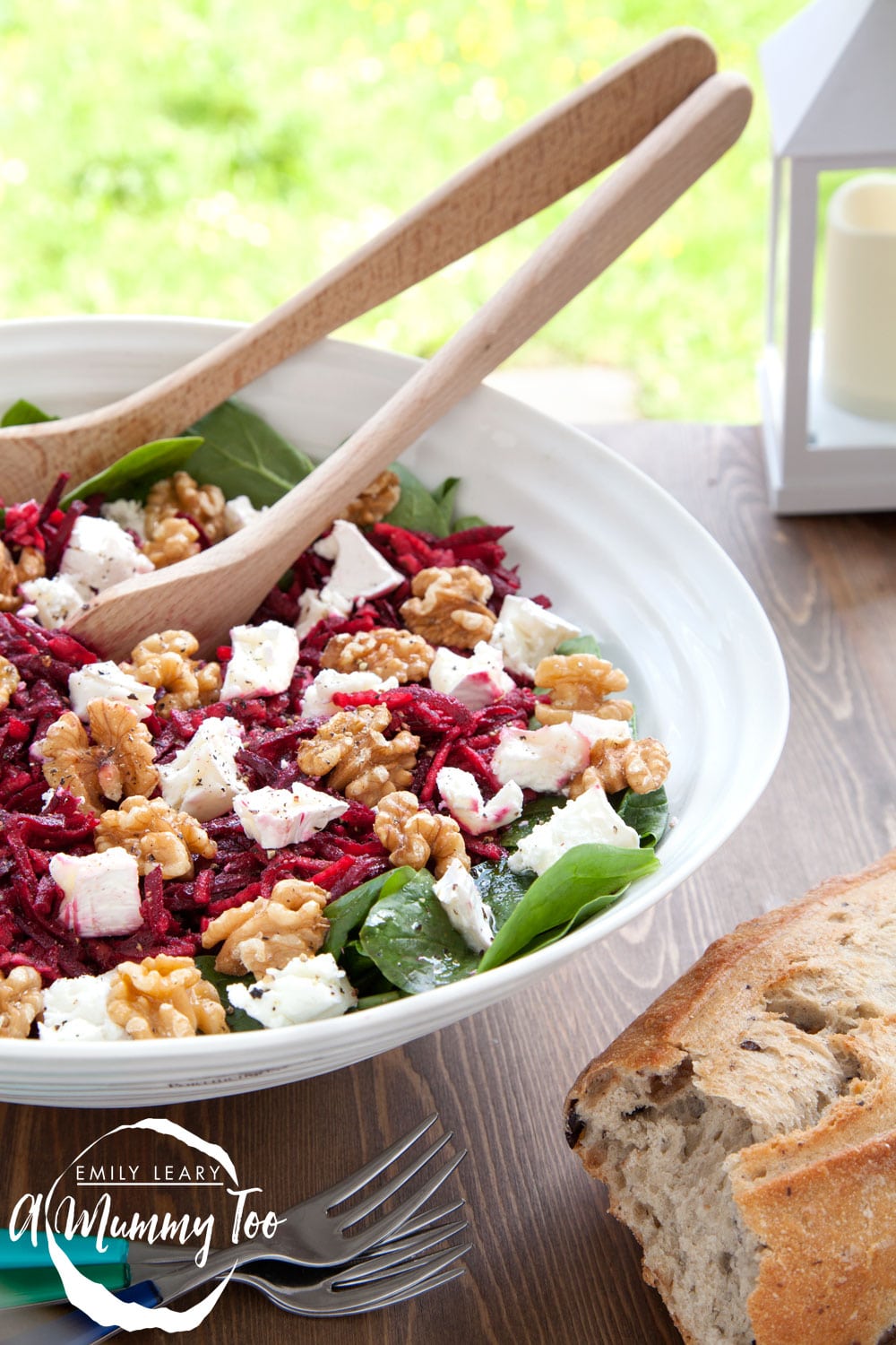 A bramley apple and beetroot salad, topped with goat's cheese and walnuts