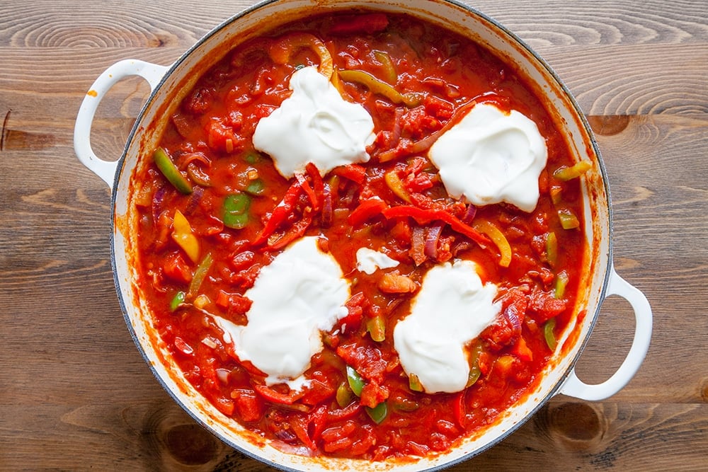 Overhead shot of Spicy tomato sauce simmering in a pan