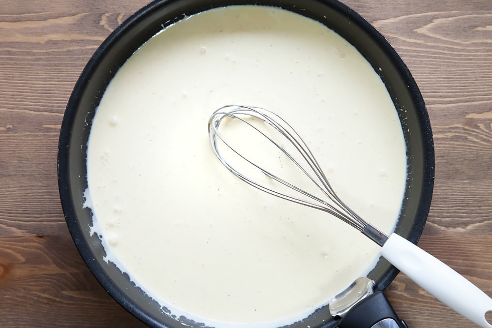 Cream, eggs and seasonings whisked together in a frying pan and whisk.