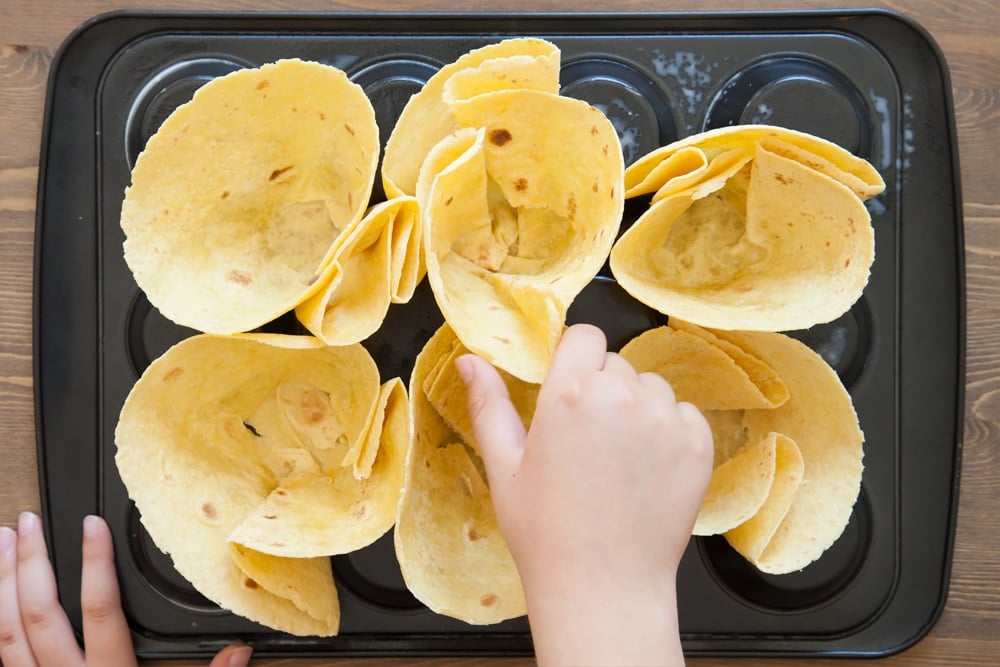 Preparing the taco cups for cooking