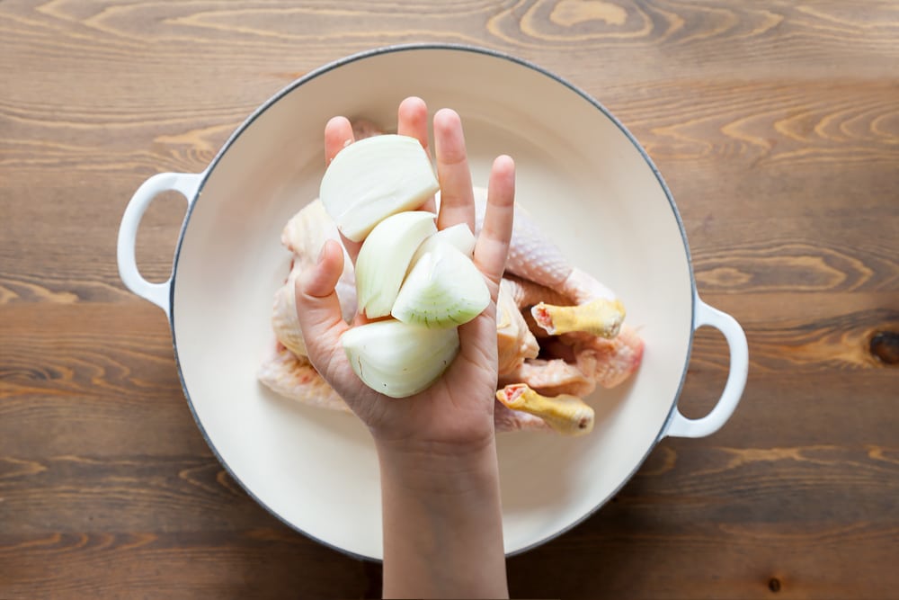 Preparing the sage and onion roast chicken