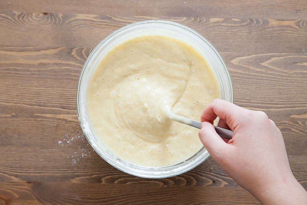Stirring the lime and white chocolate muffin batter