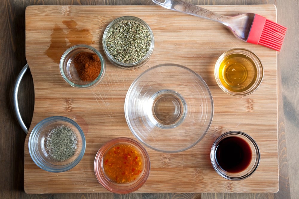 Ingredients for the piri piri glaze, shown on a chopping board