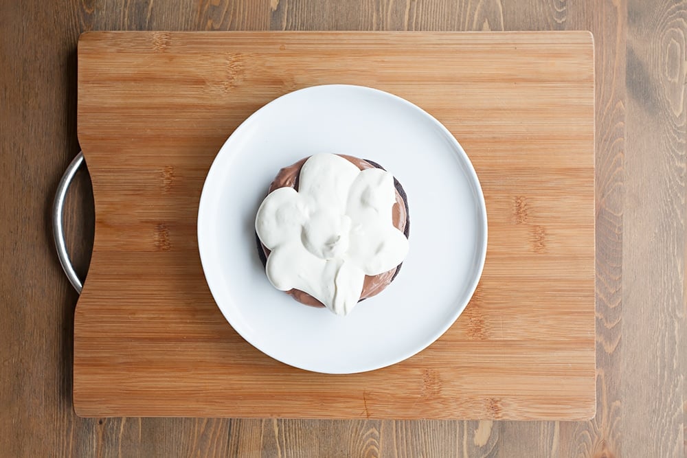Add a layer of whipped cream