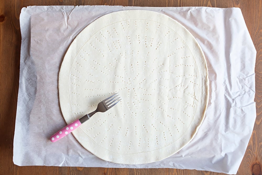 Preparing to assemble the gluten-free spinach and goat's cheese pesto tart