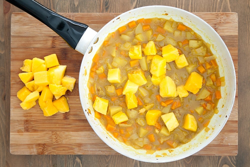 Mango is added to the vegetable curry, adding a sweet flavour and aroma