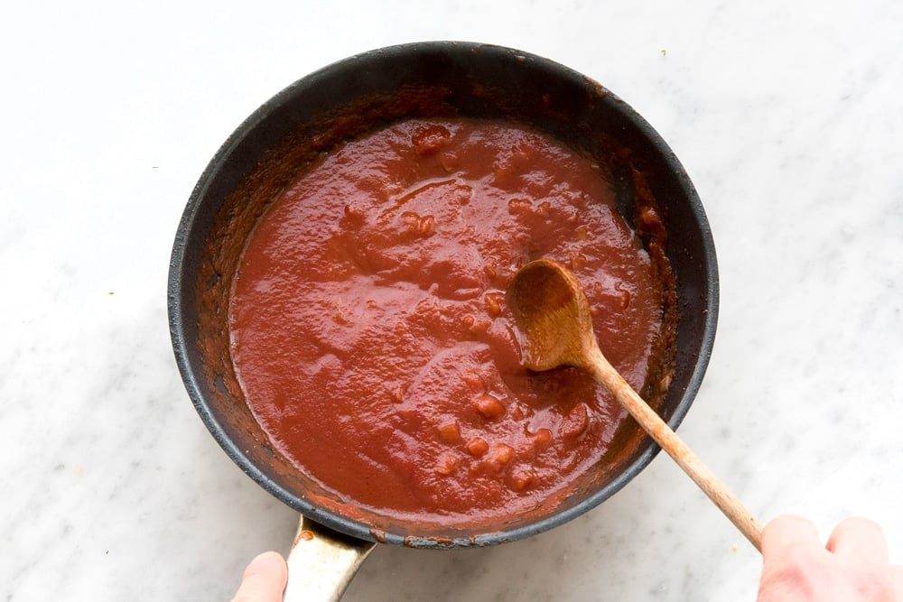 Preparing the Cajun pork marinade in a frying pan