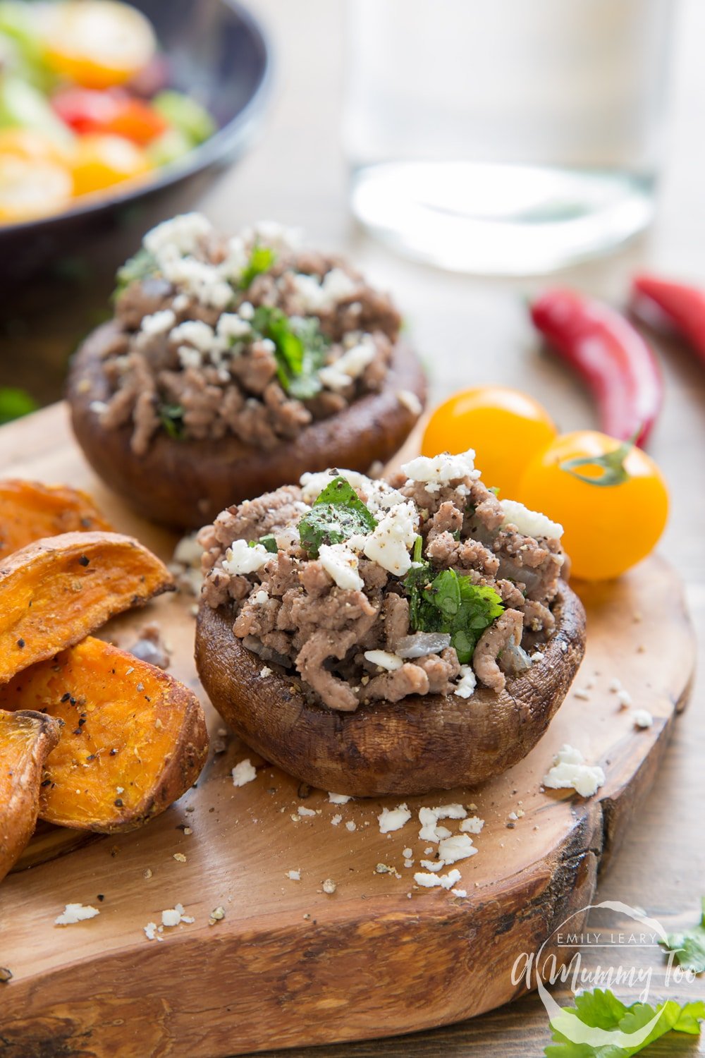 Delicious Irish beef stuffed portobello mushrooms, served alongside potato wedges and salad