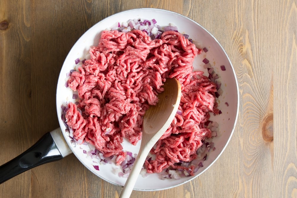 Breaking up the Irish beef mince in the frying pan