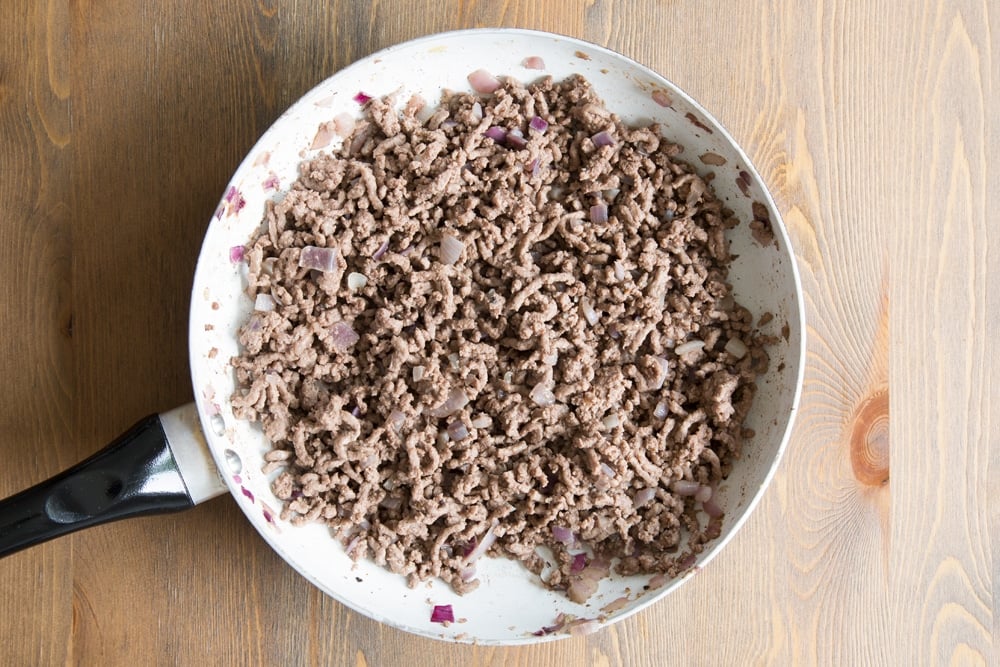 Preparing the Irish beef, ready to fill the portobello mushrooms