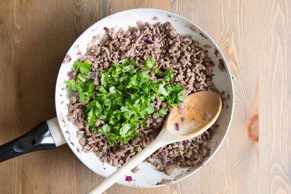 Torn coriander is added to the Irish beef mince