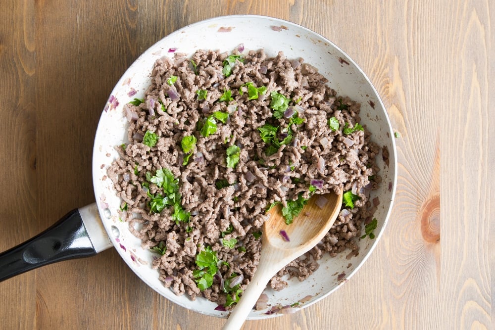 Preparing the Irish beef mince, with added coriander