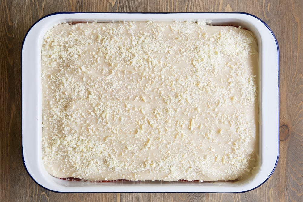 Top the strawberry lasagne with a sprinkling of white chocolate