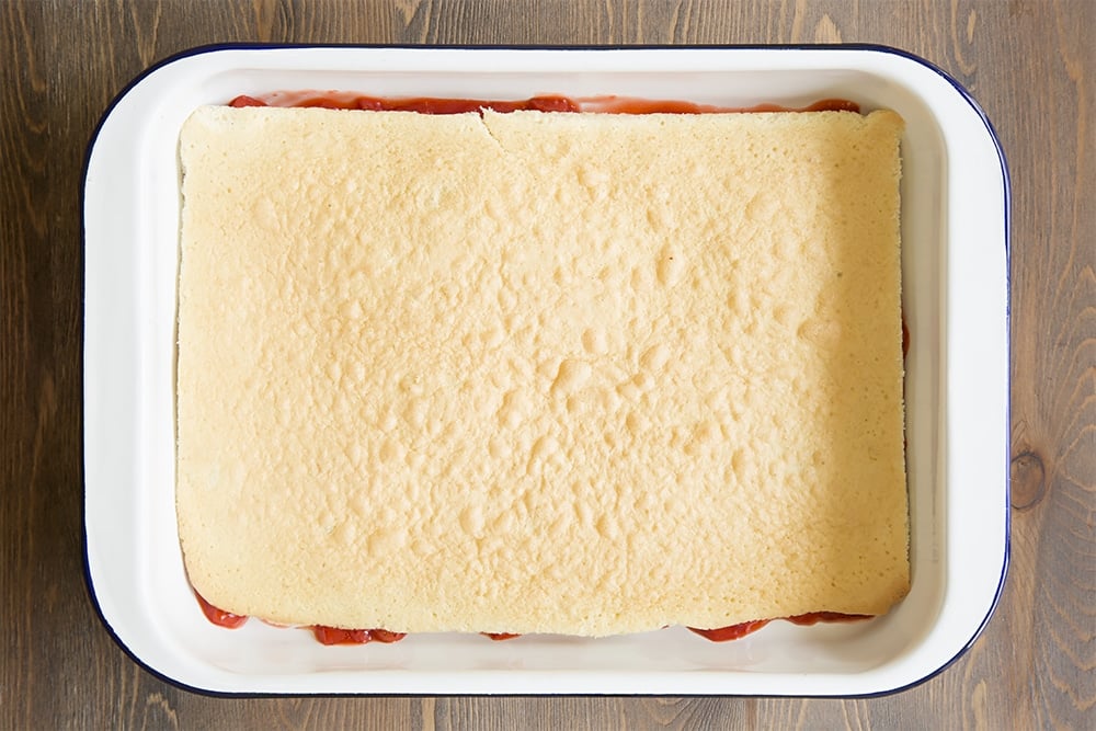 Assembling the strawberry lasagne, layer by layer