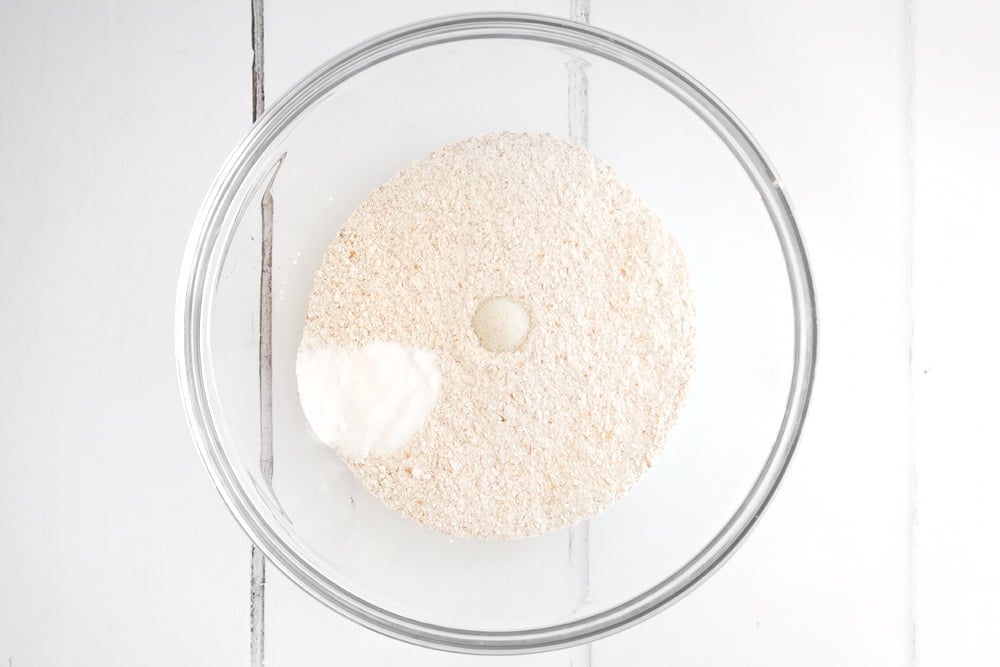 Flour, bicarb and salt shown in a bowl ready to be mixed