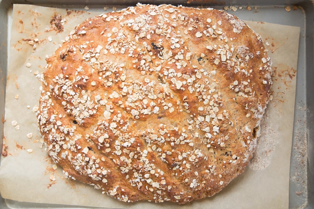 Freshly baked handmade fruit loaf, shown fresh from the oven