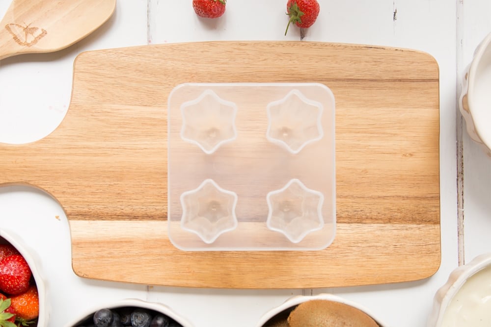 Star ice lolly mould shown empty