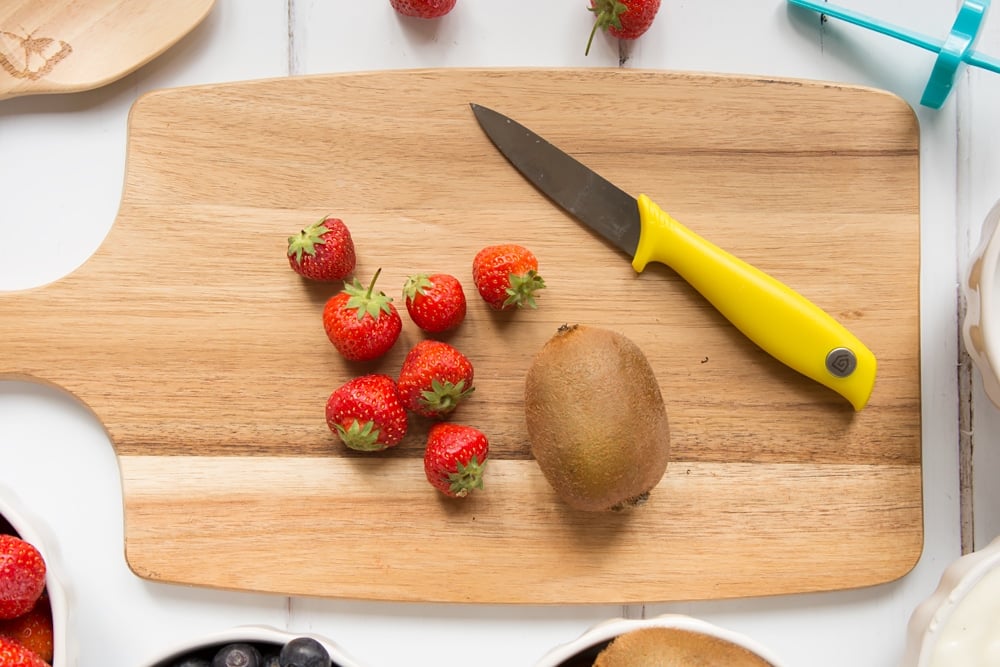 Strawberries and kiwi, ready to be chopped